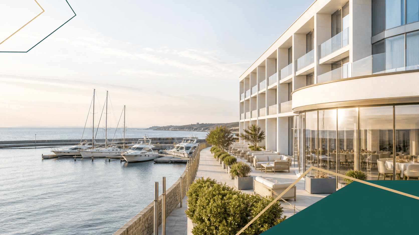 Modern waterfront hotel overlooking a marina at dawn